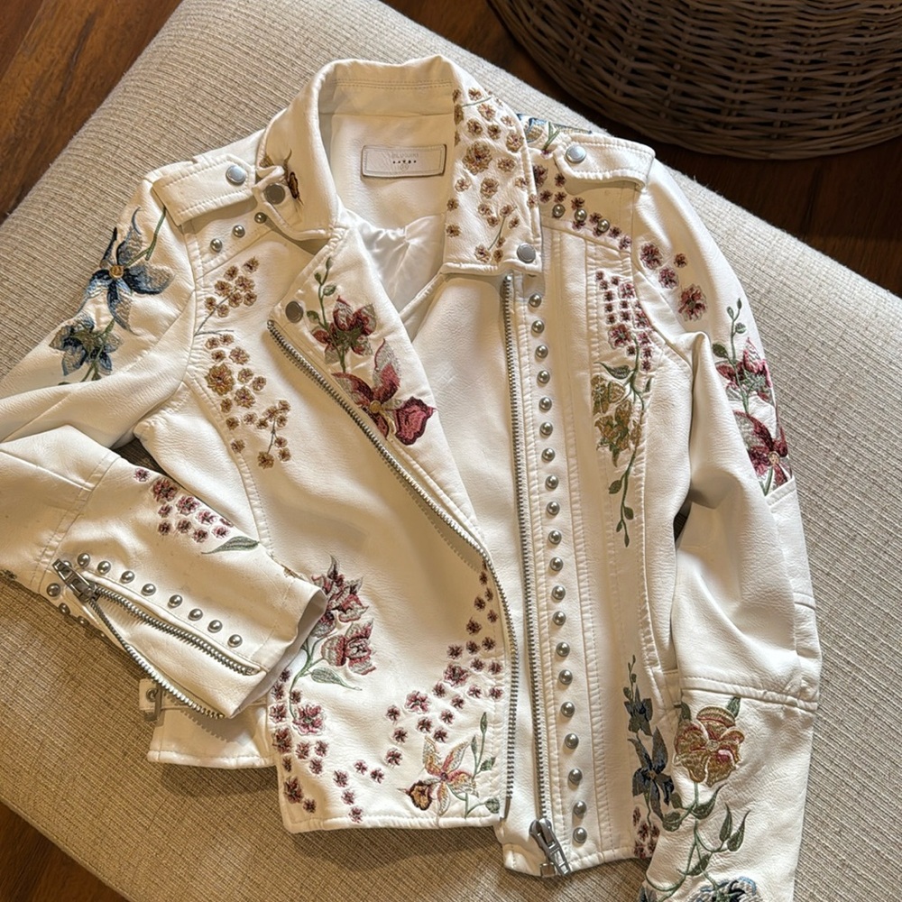 white leather jacket with embroidered